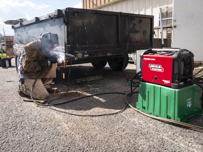 Lincoln Electric Power MIG 210 MP Multi-Process Welder Trailer Action 1